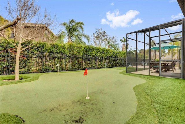 view of community with a patio area and fence