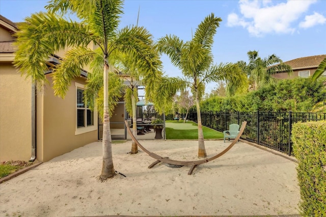 exterior space with a patio area and fence