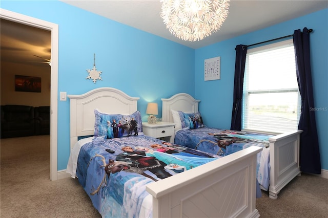 bedroom featuring baseboards, light colored carpet, and a notable chandelier