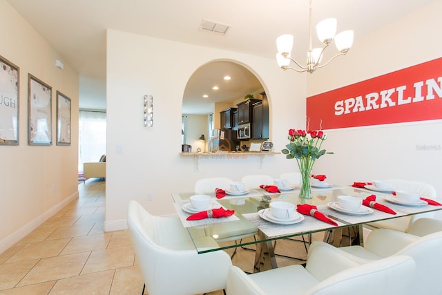 dining room featuring recessed lighting, visible vents, light tile patterned flooring, a chandelier, and baseboards