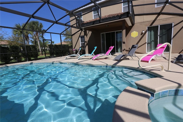 pool featuring glass enclosure