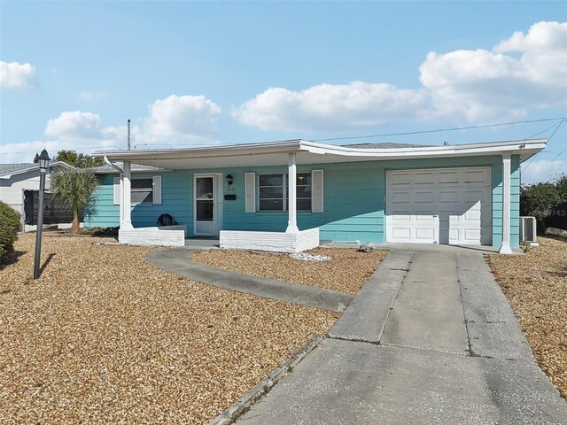 view of front of property with a garage and driveway