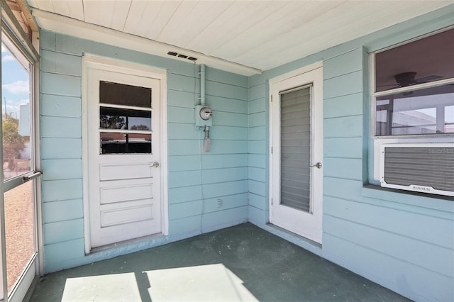 doorway to property with covered porch