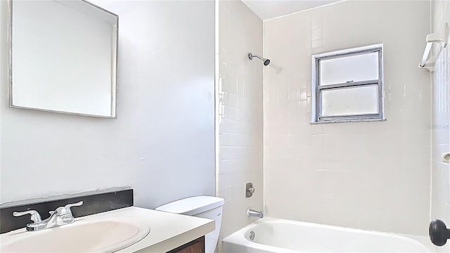 full bathroom with toilet, vanity, and shower / tub combination