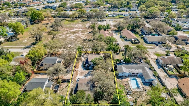 birds eye view of property with a residential view