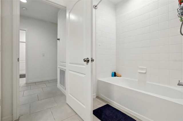 full bathroom with visible vents, baseboards, shower / washtub combination, and tile patterned floors