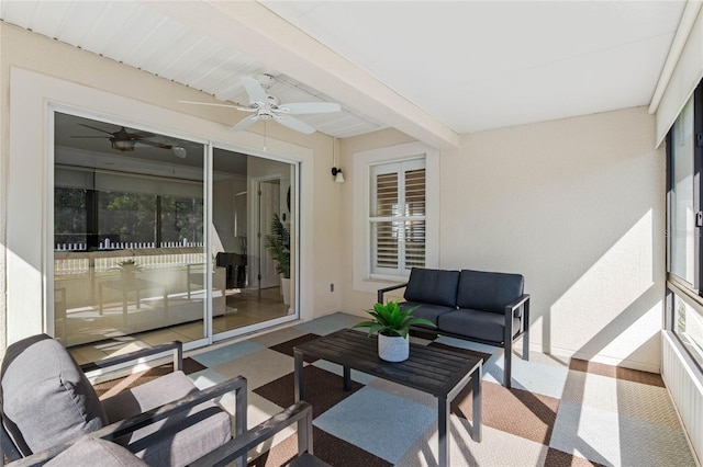 exterior space with a ceiling fan and an outdoor hangout area