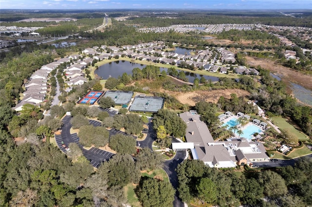 birds eye view of property featuring a residential view and a water view