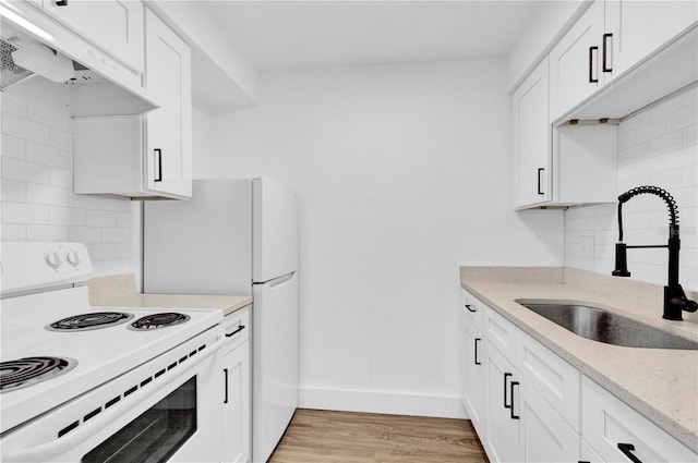 kitchen featuring tasteful backsplash, white range with electric cooktop, custom exhaust hood, white cabinetry, and a sink