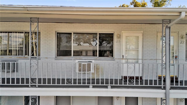 exterior space with brick siding