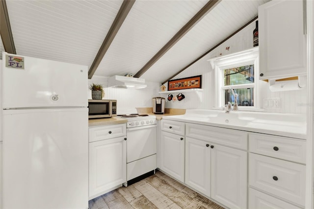 kitchen featuring white appliances, vaulted ceiling with beams, ventilation hood, light countertops, and white cabinetry