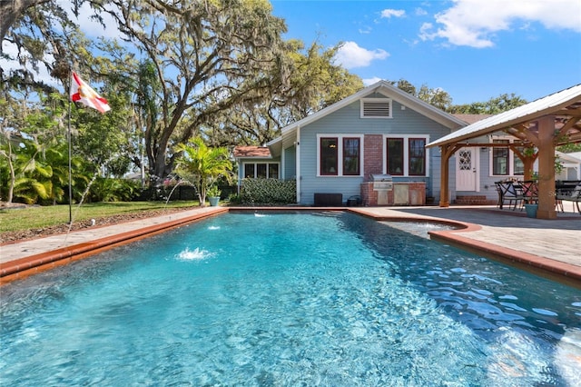 pool with a gazebo and a patio