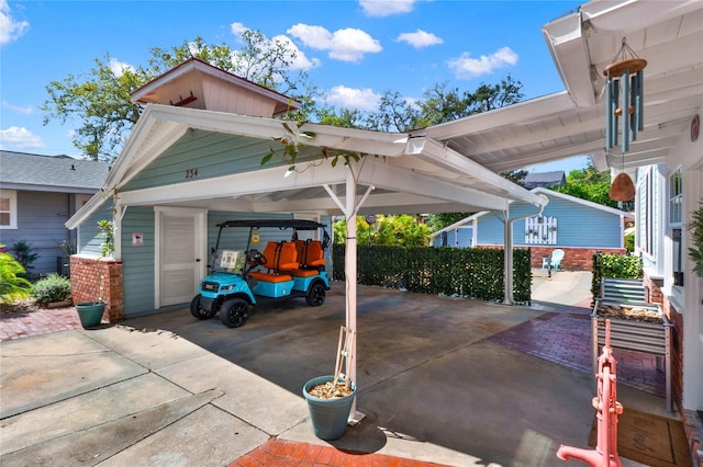 view of car parking with an attached carport and concrete driveway