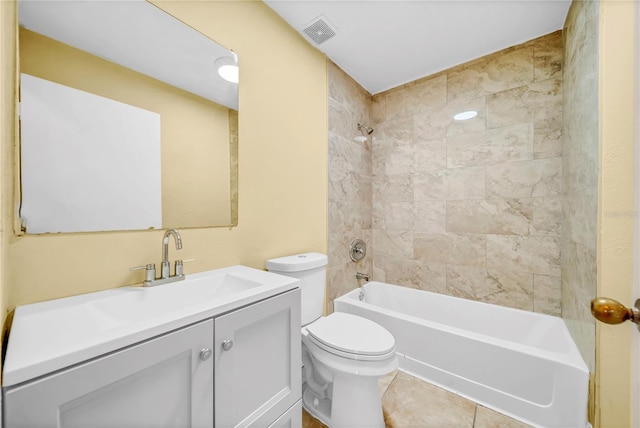 bathroom featuring tile patterned flooring, toilet, visible vents, vanity, and bathing tub / shower combination