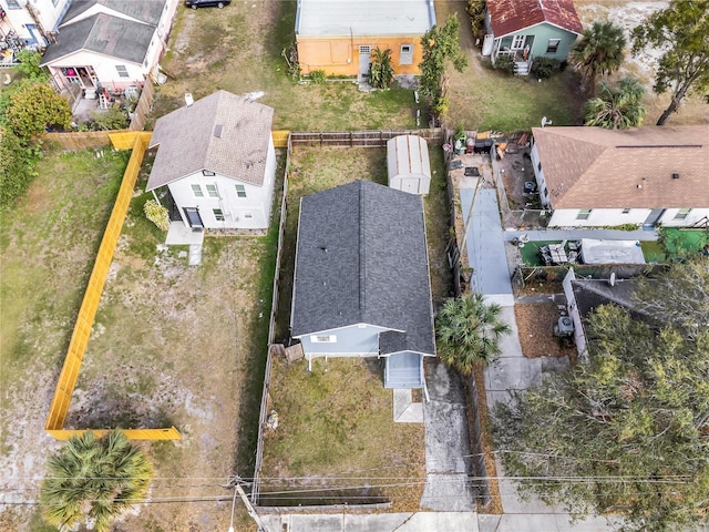 birds eye view of property with a residential view