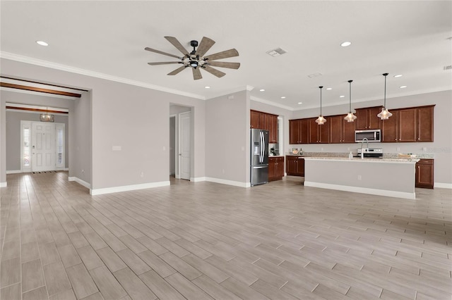 unfurnished living room featuring light wood finished floors, visible vents, and baseboards