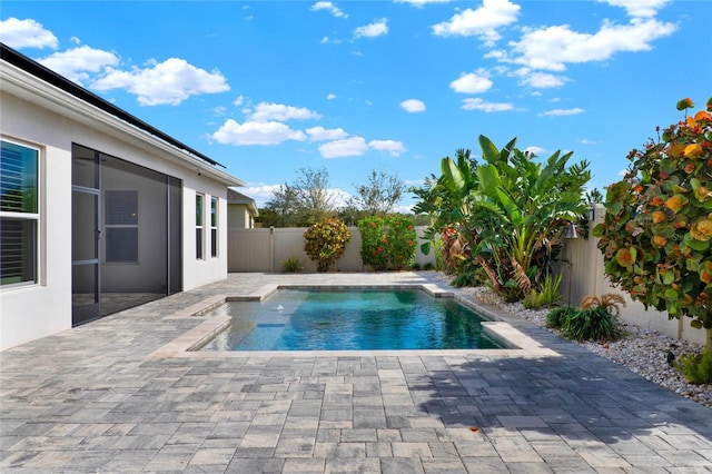 view of pool with a patio area, a fenced backyard, and a fenced in pool