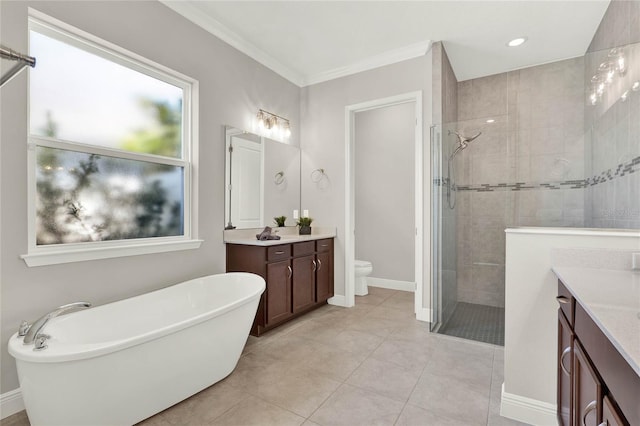 full bathroom with crown molding, a soaking tub, toilet, vanity, and walk in shower