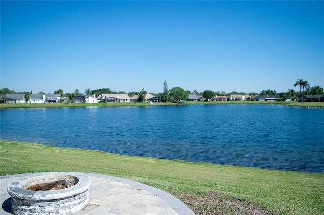 water view featuring a fire pit