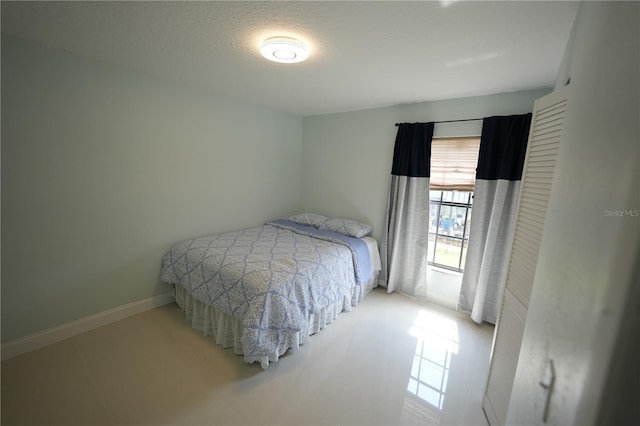14712 Eagles Crossing Dr, Orlando, FL 32837 - bedroom with tile patterned flooring and baseboards