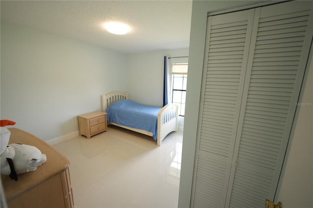 14712 Eagles Crossing Dr, Orlando, FL 32837 - bedroom with a closet and baseboards