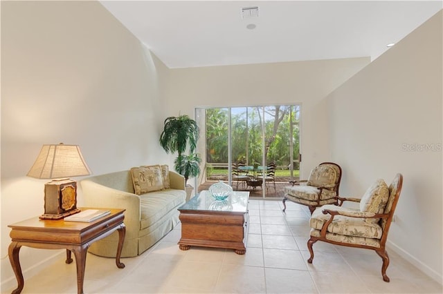 sitting room with visible vents, baseboards, and light tile patterned floors