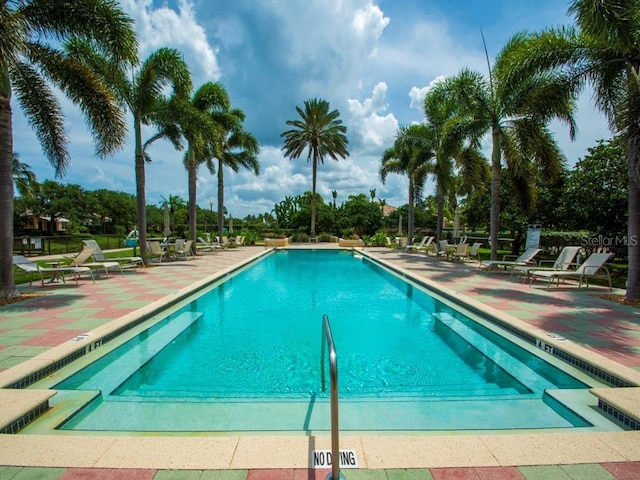 pool with a patio area