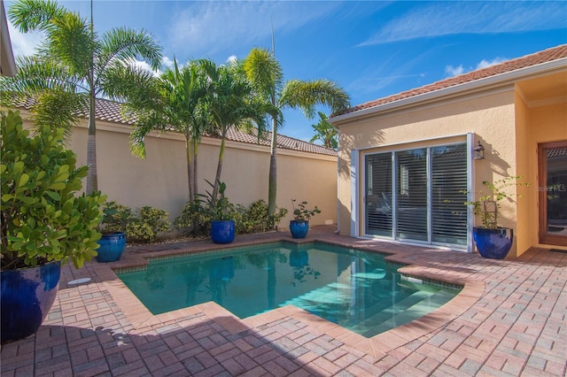 outdoor pool featuring a patio area