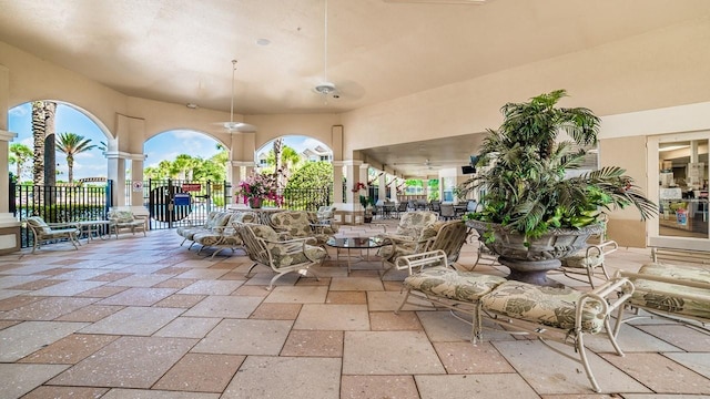 view of patio featuring fence