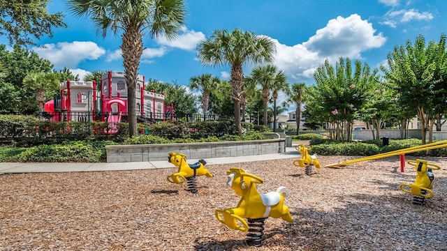 surrounding community featuring playground community and fence