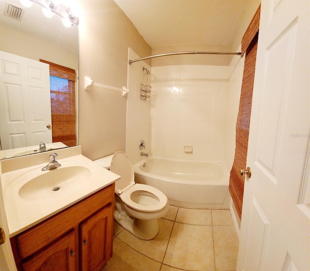 bathroom with bathtub / shower combination, visible vents, toilet, vanity, and tile patterned floors