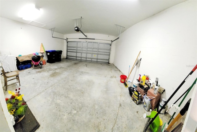 garage featuring a garage door opener