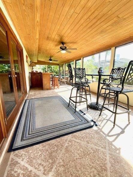 view of patio featuring a ceiling fan