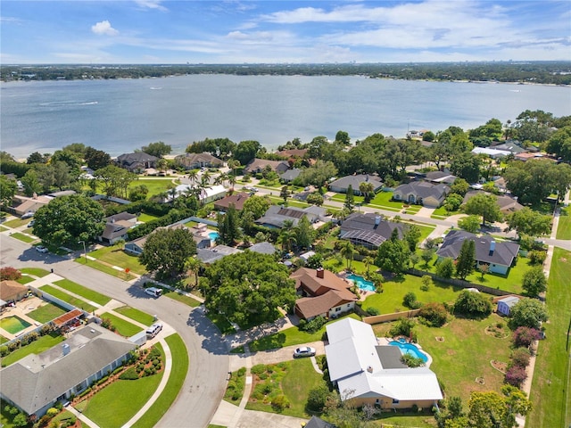 bird's eye view with a water view and a residential view