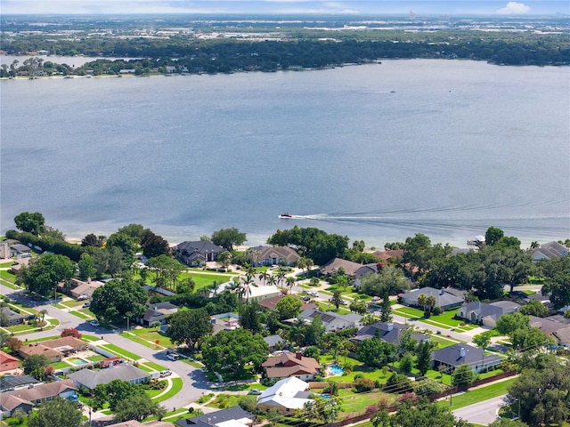 bird's eye view with a water view and a residential view