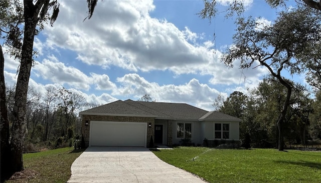 ranch-style house featuring an attached garage, roof with shingles, concrete driveway, and a front yard