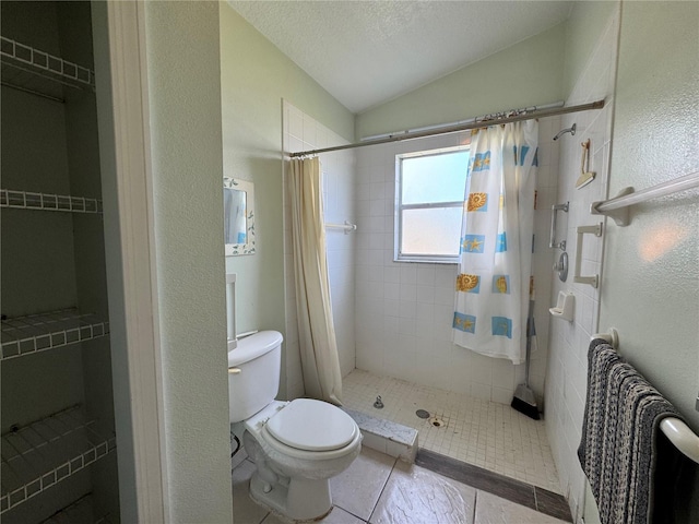 full bathroom with a textured wall, toilet, vaulted ceiling, a shower stall, and a textured ceiling