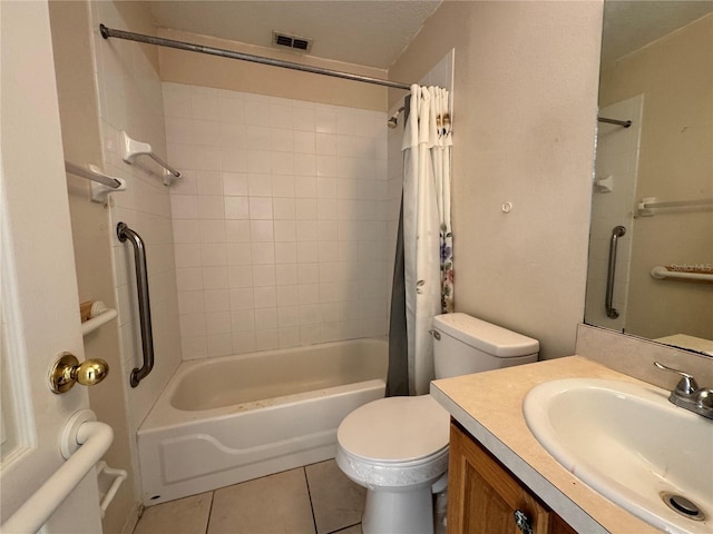 bathroom featuring visible vents, toilet, shower / tub combo with curtain, tile patterned flooring, and vanity