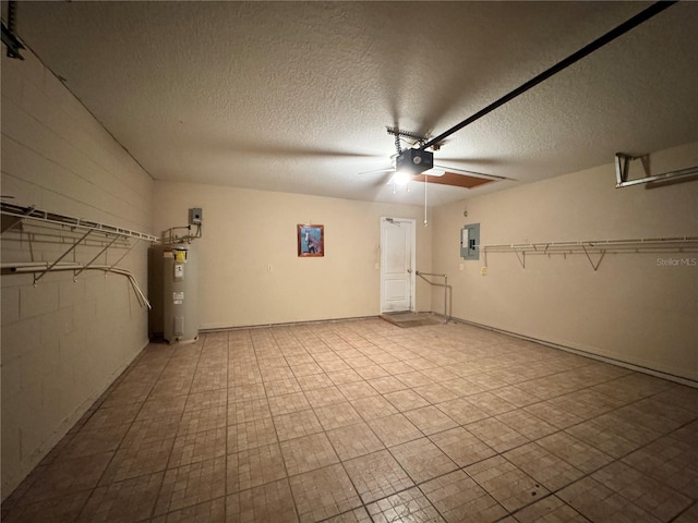 garage with water heater, concrete block wall, electric panel, and a garage door opener