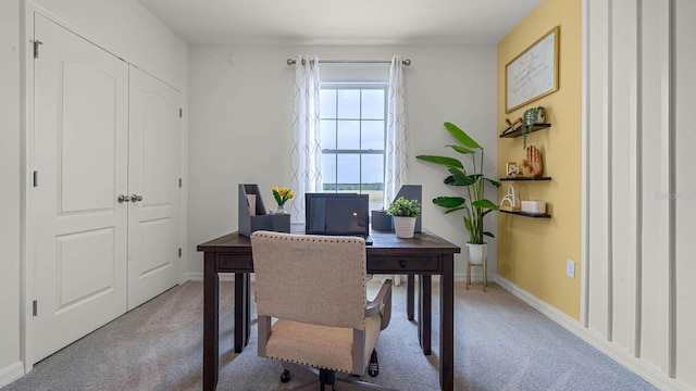 office area with baseboards and light colored carpet