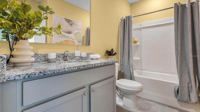 bathroom featuring toilet, shower / bathtub combination with curtain, tile patterned flooring, and vanity