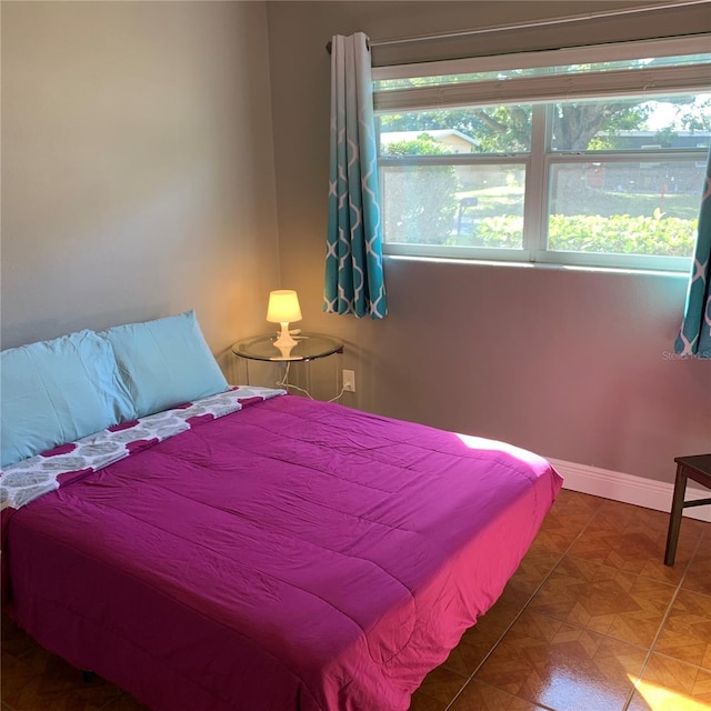 bedroom with baseboards