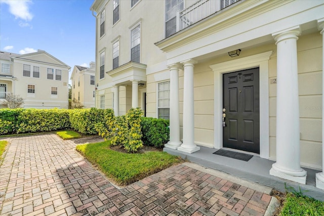 view of exterior entry featuring a residential view