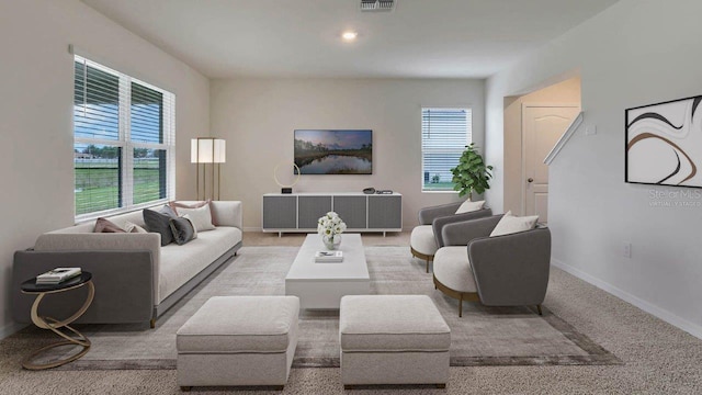 living room with visible vents, baseboards, a wealth of natural light, and recessed lighting