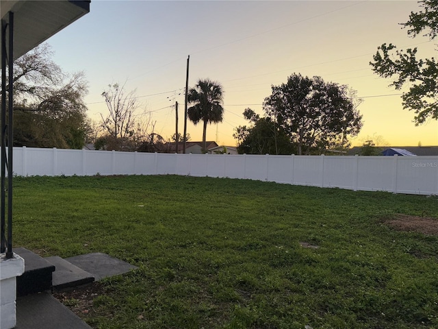 yard at dusk with fence