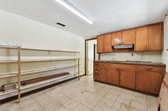 kitchen with brown cabinetry