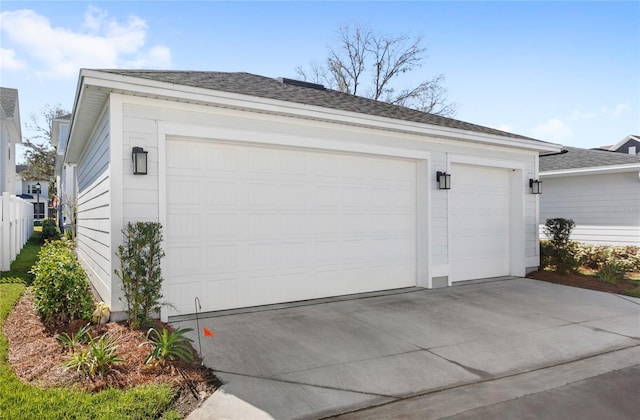 detached garage with fence