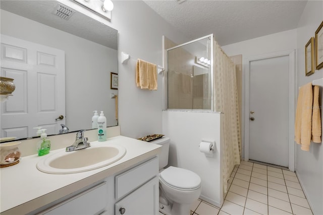 1145 Lake Rogers Cir, Oviedo, FL 32765 - bathroom featuring vanity, a shower with shower curtain, a textured ceiling, and tile patterned floors