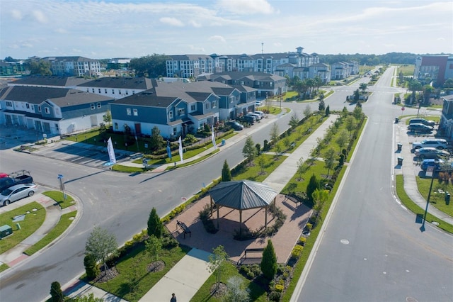 birds eye view of property with a residential view