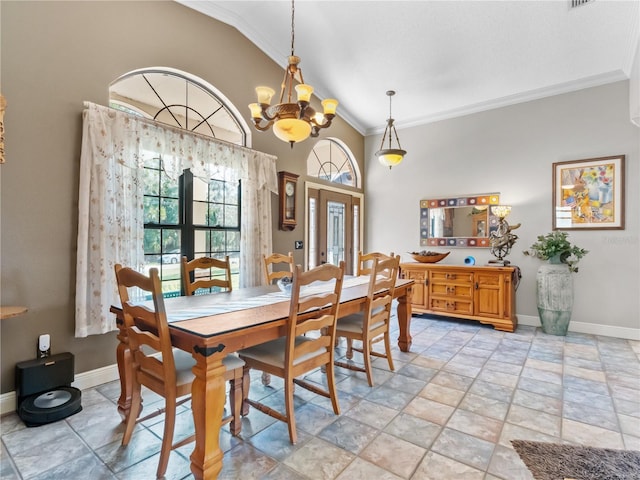 dining space featuring a chandelier, high vaulted ceiling, baseboards, french doors, and crown molding